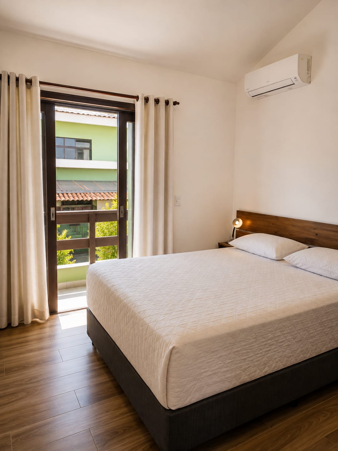 Quarto de casal com ar-condicionado