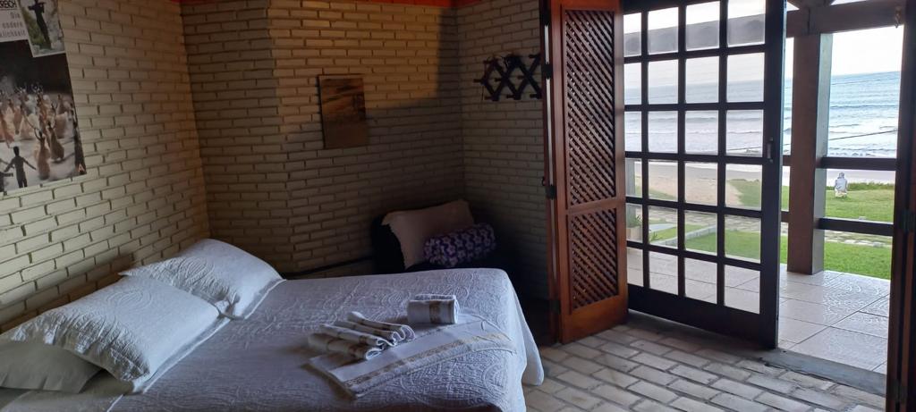 Casa Frente ao Mar Morrinho — quarto com saída para a varanda
