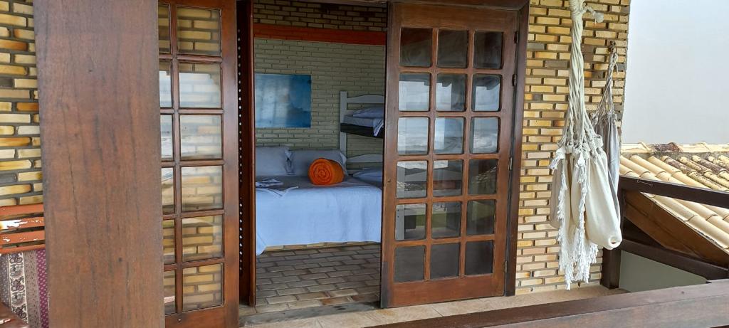 Casa Frente ao Mar Morrinho — quarto com beliche